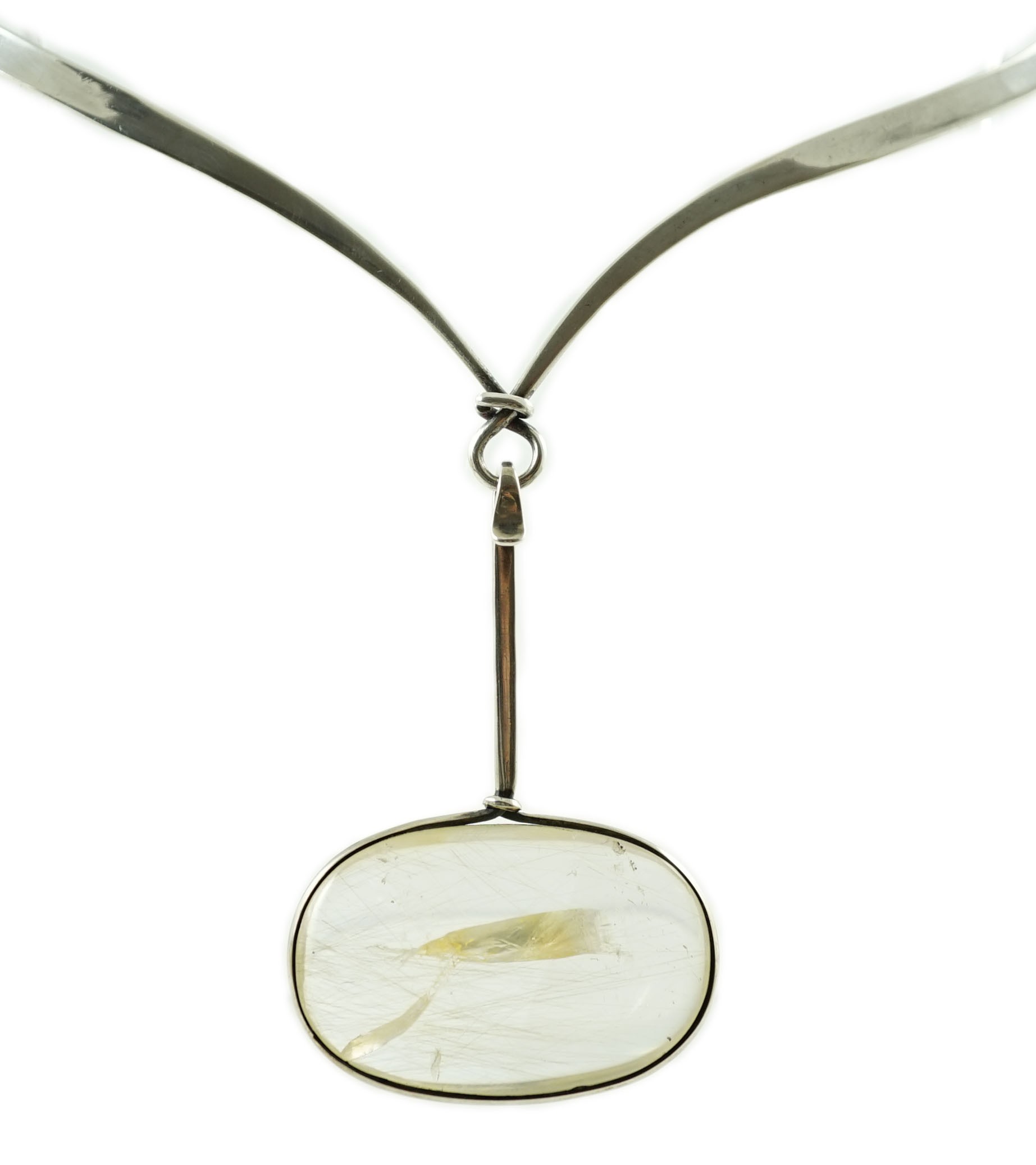 A Vivienne Torun for Georg Jensen Danish sterling silver and rutilated oval quartz set pendant necklace
